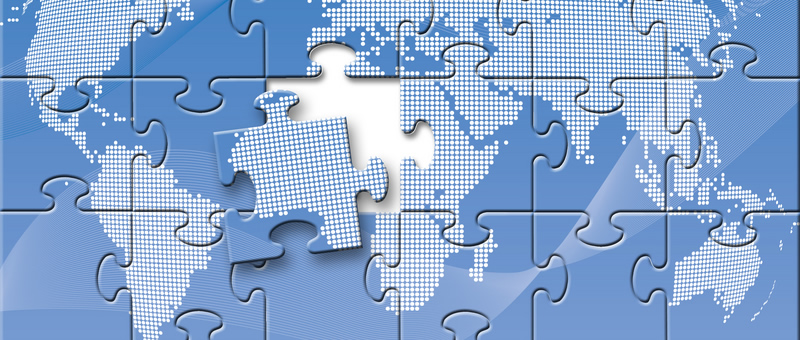 puzzle pieces showing a map of the globe